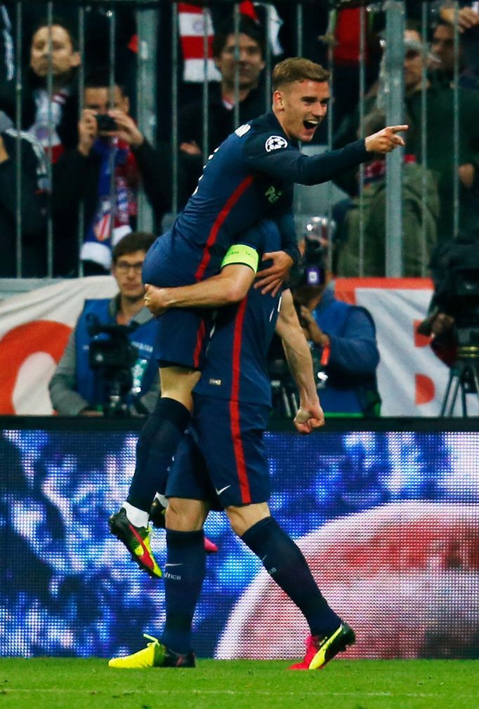 Atletico Madrid's Antoine Griezmann celebrates scoring their first goal