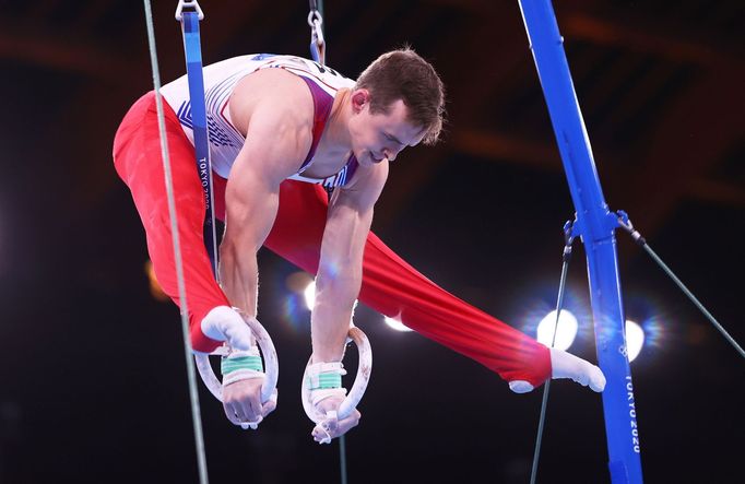 Český gymnasta David Jessen během kvalifikace sportovní gymnastiky při cvičení na kruzích.