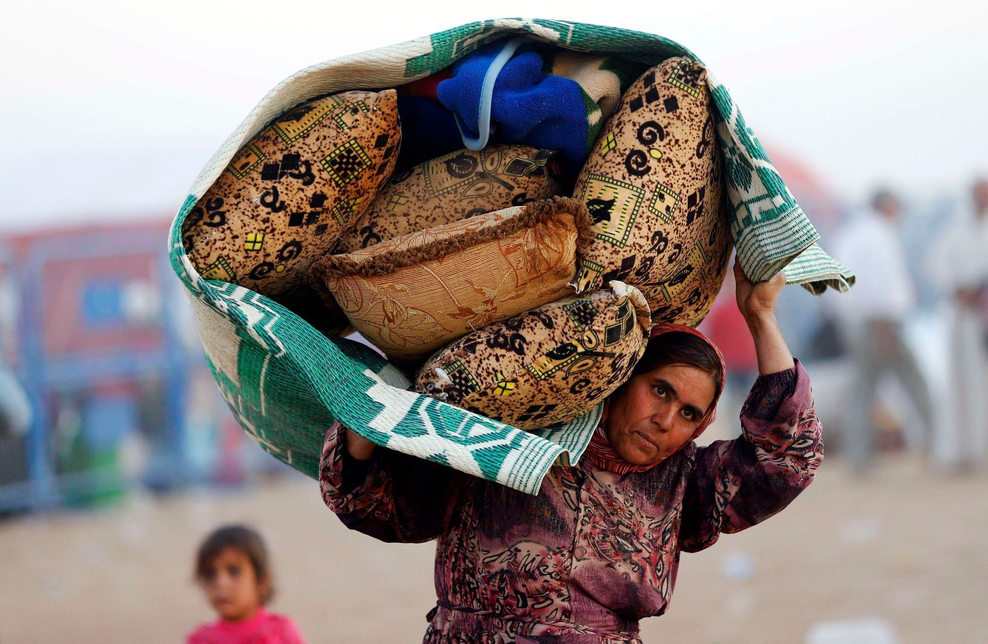 Kurdští uprchlíci u syrských hranic