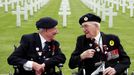 WWII veterans Richard Pelzer and George Chandler attend a ceremony at Normandy American Cemetery and Memorial situated above Omaha Beach