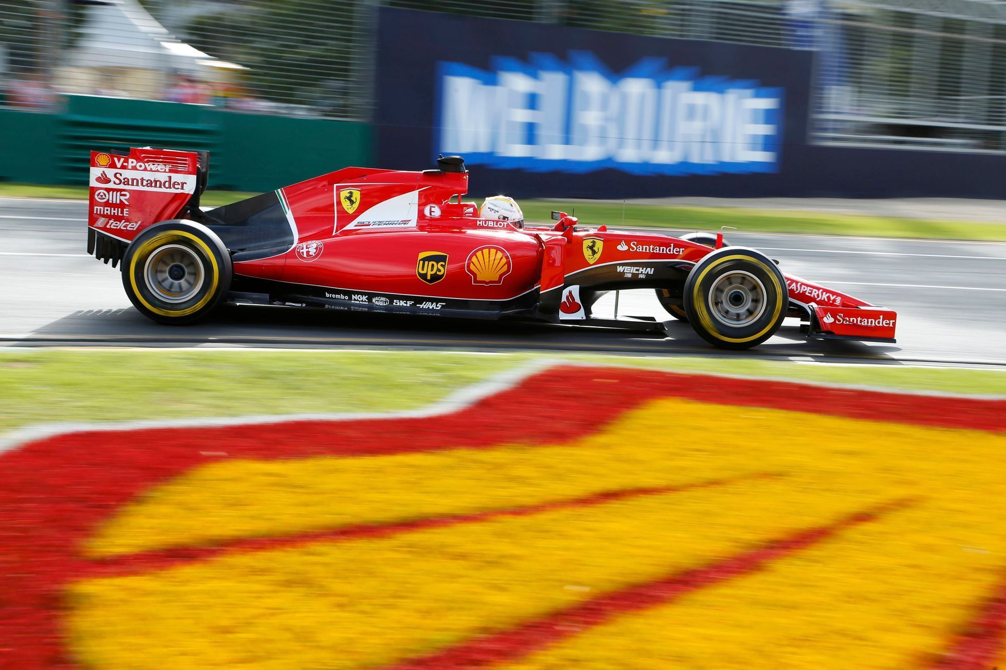 Ferrari Formula One driver Sebastian Vettel of Germany drives during the qualifying session of the Australian F1 Grand Prix at the Albert Park circuit in Melbourne