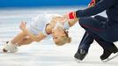 Tatiana Volosozhar and Maxim Trankov of Russia compete during the Team Pairs Short Program at the Sochi 2014 Winter Olympics