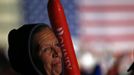 A supporter of U.S. Republican presidential nominee and former Massachusetts Governor Mitt Romney listens to his remarks during a campaign rally in Englewood, Colorado, November 3, 2012. REUTERS/Jim Young (UNITED STATES - Tags: POLITICS ELECTIONS USA PRESIDENTIAL ELECTION) Published: Lis. 4, 2012, 1:48 dop.