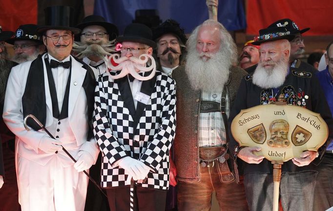 Participants take part in the 2012 European Beard and Moustache Championships in Wittersdorf near Mulhouse, Eastern France, September 22, 2012. More than a hundred participants competed in the first European Beard and Moustache Championships organized in France. REUTERS/Vincent Kessler (FRANCE - Tags: SOCIETY) Published: Zář. 22, 2012, 7:10 odp.