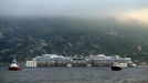 The Costa Concordia cruise liner is pictured from a ferry as it emerges during the refloating operation at Giglio harbour July 20, 2014.