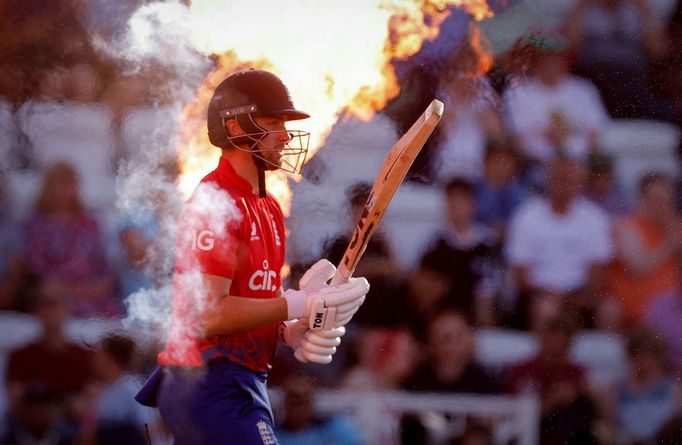 Cricket - T20 International - England v New Zealand - Trent Bridge Cricket Ground, Nottingham, Britain - September 5, 2023 England's Will Jacks walks out as fire sprays b