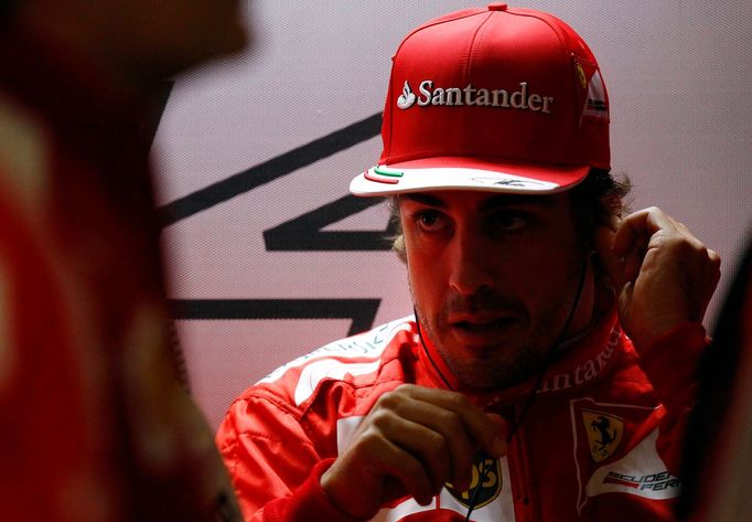 Ferrari Formula One driver Fernando Alonso of Spain prepares before the third practice session of the Chinese F1 Grand Prix at the Shanghai International circuit, April 1