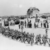 Handout photo of German POWs marching along Juno Beach landing area at Bernieres Sur Mer