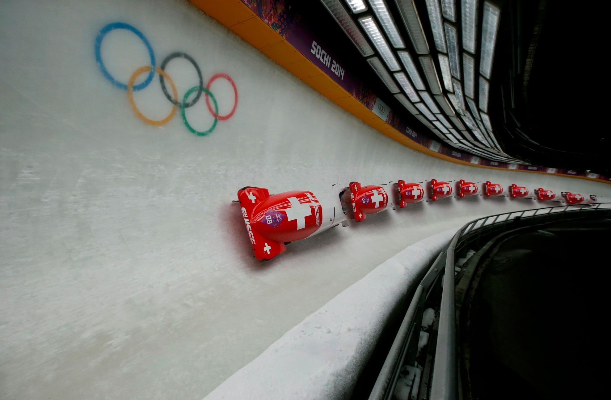 Switzerland's pilot Meyer and Mayer speed down the track during the women's bobsleigh event at the 2014 Sochi Winter Olympics