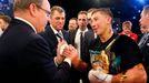 World champion Gennadiy Golovkin of Kazakhstan (R) is congratulated by Prince Albert II of Monaco (L) after winning the WBA-WBC-IBO Middleweight World Championship in Mon