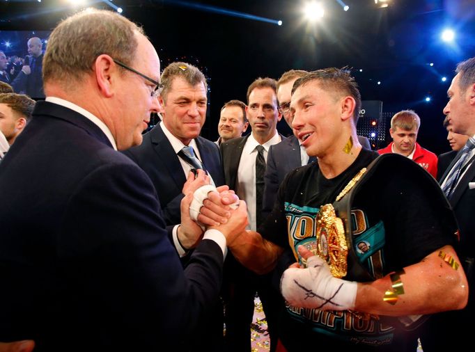 World champion Gennadiy Golovkin of Kazakhstan (R) is congratulated by Prince Albert II of Monaco (L) after winning the WBA-WBC-IBO Middleweight World Championship in Mon