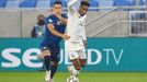 Callum Robinson in action with Slovakia’s Martin Valjent