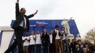 Hollande, Socialist Party candidate for the 2012 French presidential elections, waves during his campaign trip in Carmaux