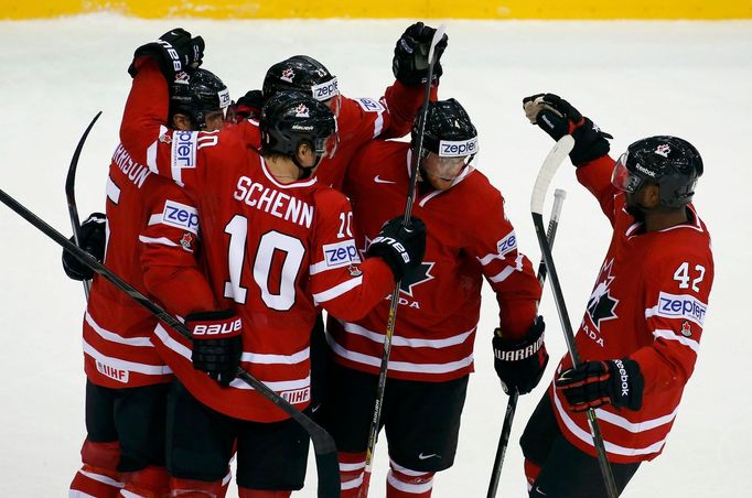 Canada's Nathan Mackinnon (3rd L) celebrates his goal against the Czech Republic with team mates during the second period of their men's ice hockey World Championship gro