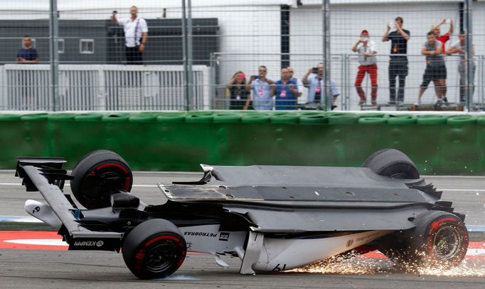 Williams Formula One driver Felipe Massa of Brazil crashes with his car in the first corner after the start of the German F1 Grand Prix at the Hockenheim racing circuit,