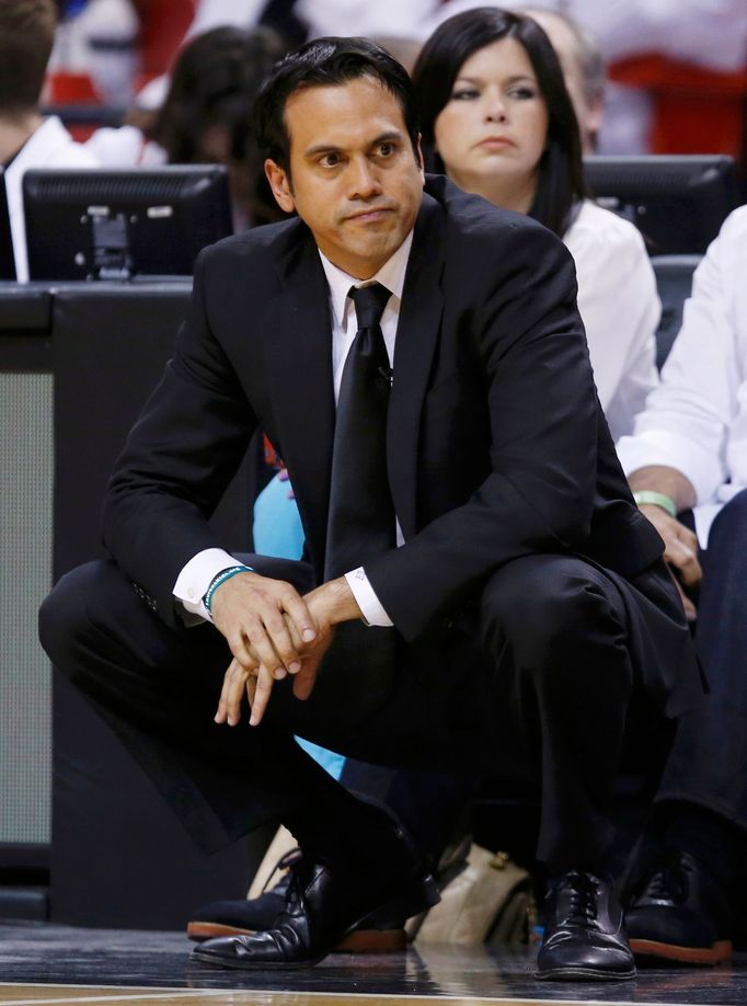 Miami Heat head coach Erik Spoelstra reacts as he watches his team play the San Antonio Spurs during the third quarter in Game 7 of their NBA Finals basketball playoff in