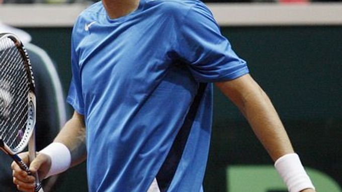 Grimasa Tomáše Berdycha pří zápase Davis Cupu s Američanem Andy Roddickem.