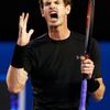 Murray of Britain reacts after hitting a shot against Djokovic of Serbia during their men's singles final match at the Australian Open 2015 tennis tournament in Melbourne