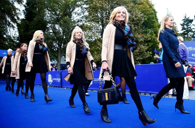 Amy Michelson wife of U.S. Team golfer Phil smiles as she walks in during the opening ceremony of the 40th Ryder Cup at Gleneagles