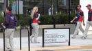 LOCOG employees cross Celebration Avenue in the Olympic Village built for the London 2012 Olympic Games in Stratford, east London on June 29, 2012. The village will accomodate up to 16,000 athletes and officials from more than 200 nations. Picture taken June 29, 2012. REUTERS/Olivia Harris (BRITAIN - Tags: BUSINESS EMPLOYMENT SPORT OLYMPICS CONSTRUCTION CITYSPACE) Published: Čer. 30, 2012, 12:23 odp.