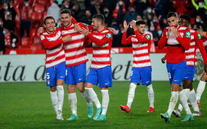 Soccer Football - LaLiga - Granada v Atletico Madrid - Nuevo Estadio de Los Carmenes, Granada, Spain - December 22, 2021 Granada players celebrate after the match REUTERS