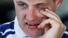 Sauber Formula One driver Marcus Ericsson of Sweden rubs his eye during the second practice session of the Australian F1 Grand Prix at the Albert Park circuit in Melbourn