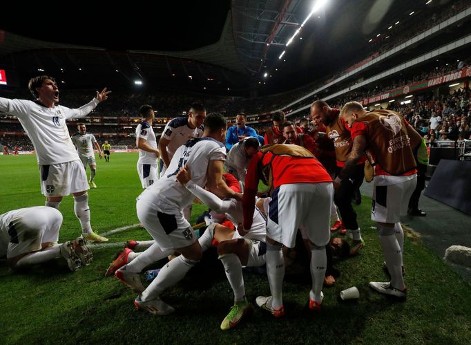 Soccer Football - World Cup - UEFA Qualifiers - Group A - Portugal v Serbia - Estadio da Luz, Lisbon, Portugal - November 14, 2021 Serbia's Aleksandar Mitrovic celebrates