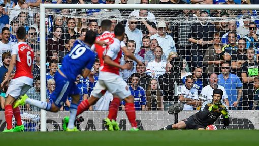 Arsenal's Petr Cech saves a shot from Chelsea's Diego Costa