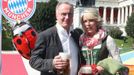 FC Bayern Munich's CEO Bayern Muenchen Rummenigge and his wife Martina pose during their visit at the Oktoberfest in Munich