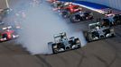 Mercedes Formula One driver Nico Rosberg of Germany leads next to Mercedes Formula One driver Lewis Hamilton of Britain (R) after the start of the first Russian Grand Pri