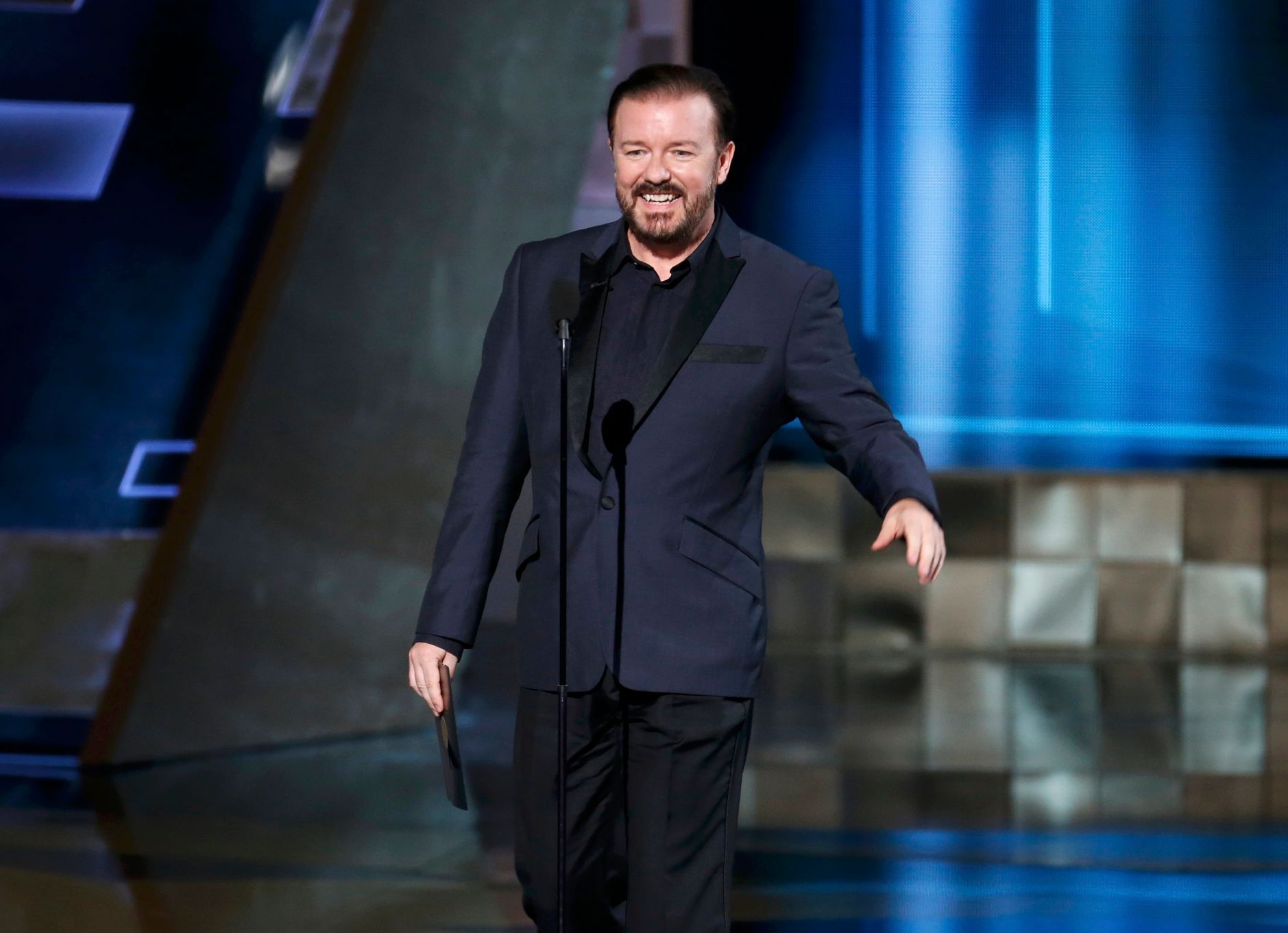 Presenter Ricky Gervais takes the stage at the 67th Primetime Emmy Awards in Los Angeles