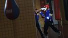 Argentine born boxer Tamara Fabiana Garcia gets punched in the face by fellow boxer Jennifer Miranda during a training session at a high-performance sports centre in Los Alcazares, southeastern Spain, April 2, 2012. Five young fighters are training hard ahead of next month's world championships in Qinhuangdao, China, where competition will be fierce for the precious 24 qualification slots - eight in each of the three weight categories - for this year's summer Games. Women's boxing is being included in the Olympics for the first time in London and while the Spanish hopefuls know it will be incredibly tough to even qualify, they are filled with pride that the sport they have dedicated their lives to is finally getting the recognition they believe it deserves. Picture taken April 2, 2012. TO MATCH FEATURE OLYMPICS-BOXING/WOMEN-SPAIN REUTERS/Susana Vera (SPAIN - Tags: SPORT BOXING OLYMPICS)