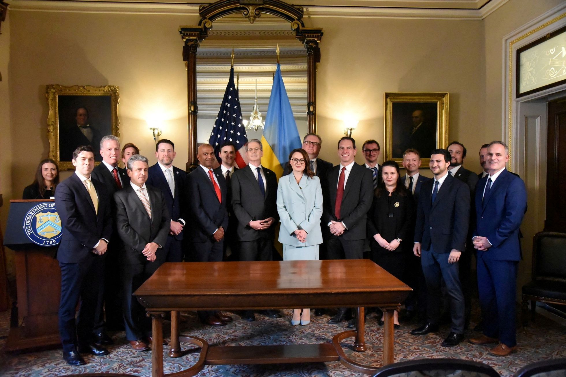 U.S. Treasury Secretary Bessent and Ukrainian First Deputy Prime Minister Svyrydenko sign a deal in Washington