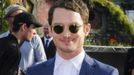 Actor Elijah Wood, who plays the character Frodo, poses on the red carpet at the world premiere of 'The Hobbit - An Unexpected Journey' in Wellington November 28, 2012. New Zealand's capital city was taken over by pointy-eared, costumed Hobbit fans on Wednesday, many of whom camped overnight to grab the best spots for the red carpet world premiere of the film later in the day. REUTERS/Mark Coote (NEW ZEALAND - Tags: ENTERTAINMENT) Published: Lis. 28, 2012, 8:26 dop.