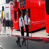 Police officers patrol paddock before final practice session