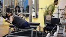 Wheelchair-bound Palestinian freelance photographer Moamen Qreiqea exercises in a gym in Gaza City October 1, 2012. Qreiqea, 25, lost both his legs in an Israeli air strike in 2008 while taking pictures east of Gaza. The father of two is determined to continue his career despite his disability. REUTERS/Suhaib Salem (GAZA - Tags: MEDIA SOCIETY) Published: Říj. 1, 2012, 3:39 odp.