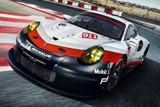 Porsche 911 RSR - Na autosalonu se neukazovaly jen vozy určené na silnici. Porsche se pochlubilo závodním speciálem 911 RSR s uprostřed uloženým motorem.