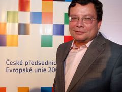 Deputy PM for EU Affairs Alexandr Vondra in front of the logo