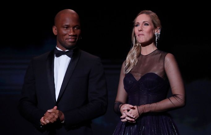 Soccer Football - The Ballon d’Or awards - Theatre du Chatelet, Paris, France - December 2, 2019   Ivory Coast legend Didier Drogba with Sandy Heribert during the awards