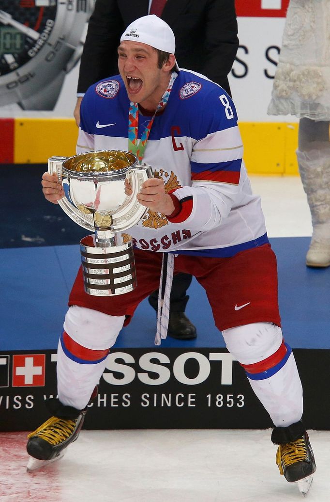 Russia's Alexander Ovechkin celebrates with the trophy after winning their men's ice hockey World Championship final game against Finland at Minsk Arena in Minsk May 25,