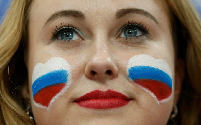 A fan of Russia reacts during the first period of their men's ice hockey World Championship final game against against Finland at Minsk Arena in Minsk May 25, 2014. REUTE