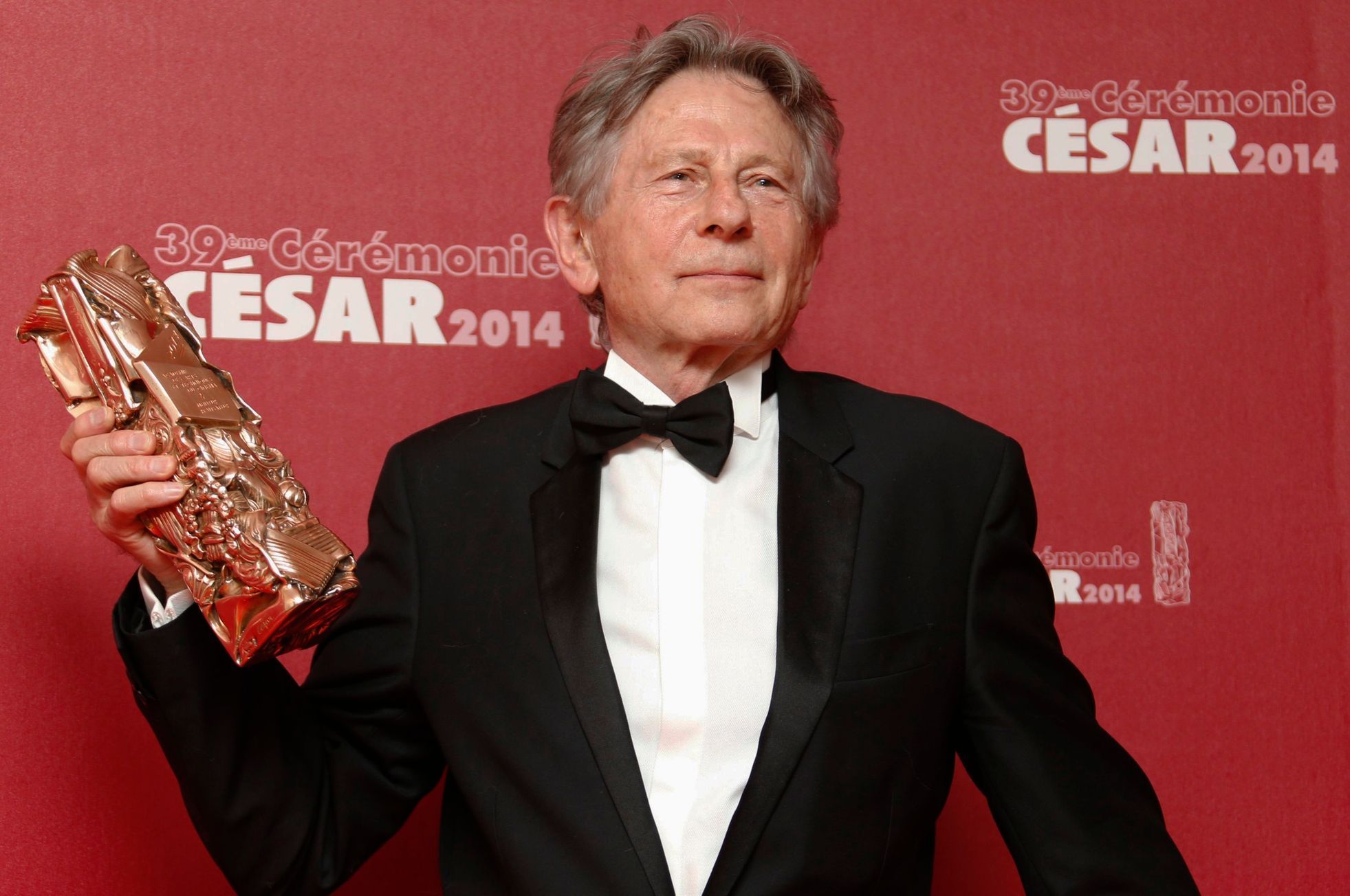 Roman Polanski poses with Best Director award for &quot;La Venus A La Fourrure&quot; at the 39th Cesar Awards ceremony in Paris