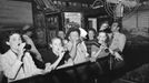 2_ Men and women drinking beer at a bar inRaceland, Louisiana, September 1938. Pre-Prohibition saloons were mostly male establishments; post-Prohibition bars catered to both males and females. Drinking at beer the bar, Raceland, Louisiana. September 1938. Author Russell Lee