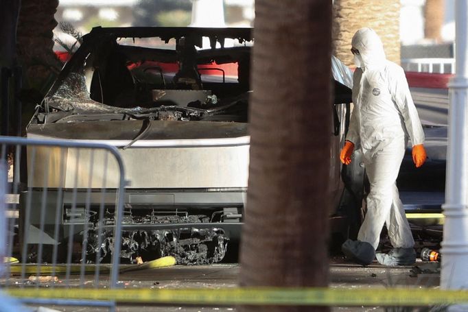 The remains of a Tesla Cybertruck that burned at the entrance of Trump Tower, are inspected in Las Vegas, Nevada, U.S. January 1, 2025.  REUTERS/Ronda Churchill