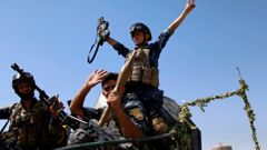 Člen irácké policie v Mosulu.