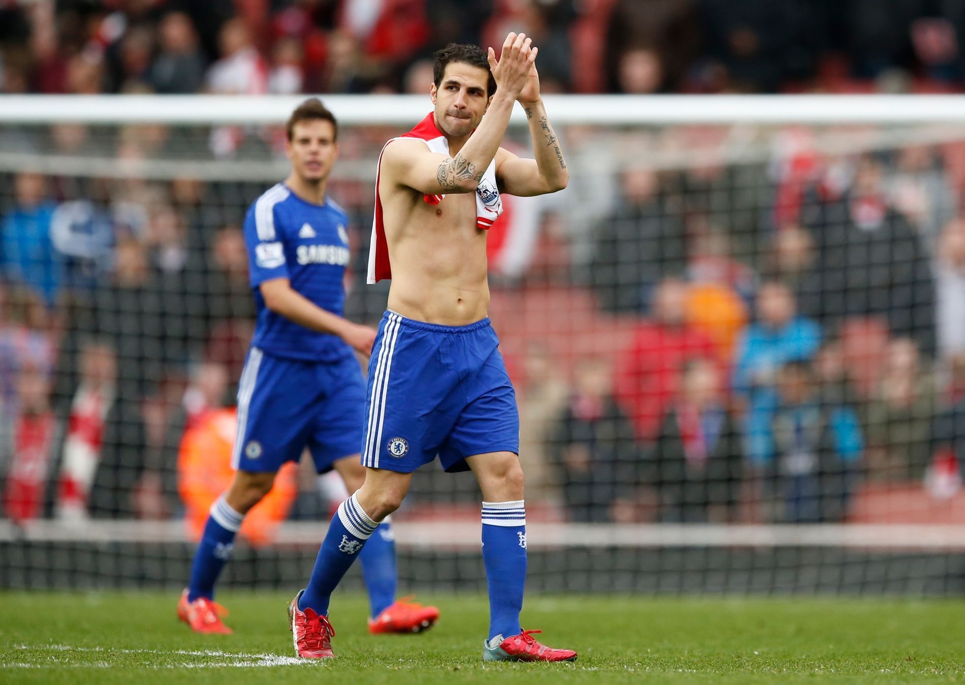 Football: Chelsea's Cesc Fabregas applauds the fans after the game