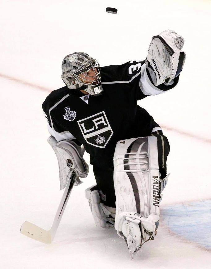 Los Angeles Kings goalie Jonathan Quick makes a save against the New York Rangers during the third period in Game 1 of their NHL Stanley Cup Finals hockey series in Los A