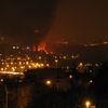 Požár Průmyslového paláce na pražském Výstavišti. Foceno z ulice Nad Rokoskou