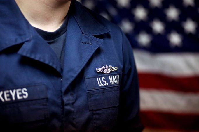 April 24, 2011 - Cape Canaveral, Florida, U.S. - -- Cape Canaveral, Fla. -- Culinary Specialist Seaman Tyler Keyes, of Stillwater, Minnesota, shown wearing his Submarine qualification pins during a Dolphin presentation in the Crew's Mess aboard the USS Annapolis (SSN 760), a S6G nuclear reactor powered fast attack submarine, sailing from Cape Canaveral on Sunday. The pins were first authorized for use in 1941. To ''Qualify Submarines,'' a submariner must possess an in-depth knowledge of ship's construction, operation, and damage control and demonstrate his reliability under battle conditions. The USS Annapolis measures 362 ft. in length and 33 ft. at the beam, a diving depth of over 400 ft., 27+ mph, 12 vertical launch missile tubes, 4 torpedo tubes, and a crew of 130 enlisted submariners. The submarine was commissioned April 11, 1992 with its homeport in Groton