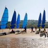 Tourists take part in a land sailing class on the former D-Day landing zone of Omaha beach near Vierville sur Mer